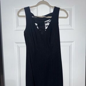 Sultry black low v neck dress